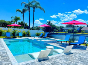 NEW Stunning Delray Waterfront Oasis - Heated Pool, Spa, Canal, Dock, Huge Patio, Pool Table!